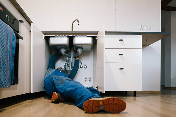 Professional Drain Cleaning technician working in North Liberty, IA